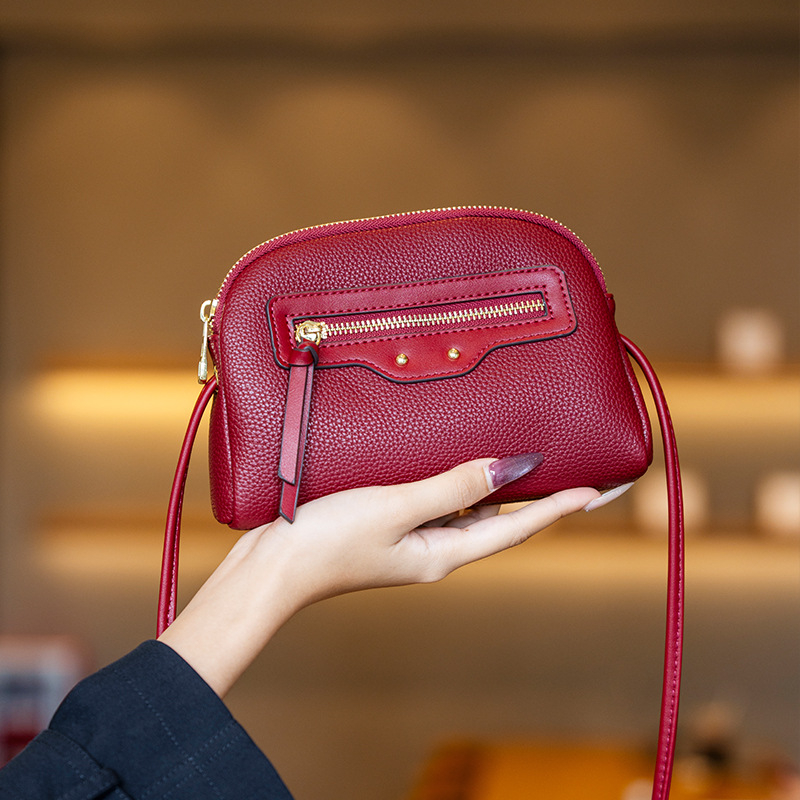 GELANDAI Crossbody soma – minimālistisks dizains, mazs kvadrātveida formāts, PU materiāls, rāvējslēdzējs aizvēršanai, iekšējie nodalījumi: tālruņa kabata, slēgta rāvējslēdzēja kabata, nodalījums, klēpjdatora kabata