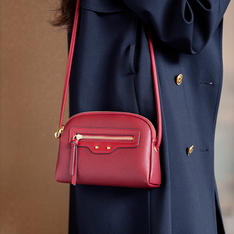 GELANDAI Crossbody soma – minimālistisks dizains, mazs kvadrātveida formāts, PU materiāls, rāvējslēdzējs aizvēršanai, iekšējie nodalījumi: tālruņa kabata, slēgta rāvējslēdzēja kabata, nodalījums, klēpjdatora kabata