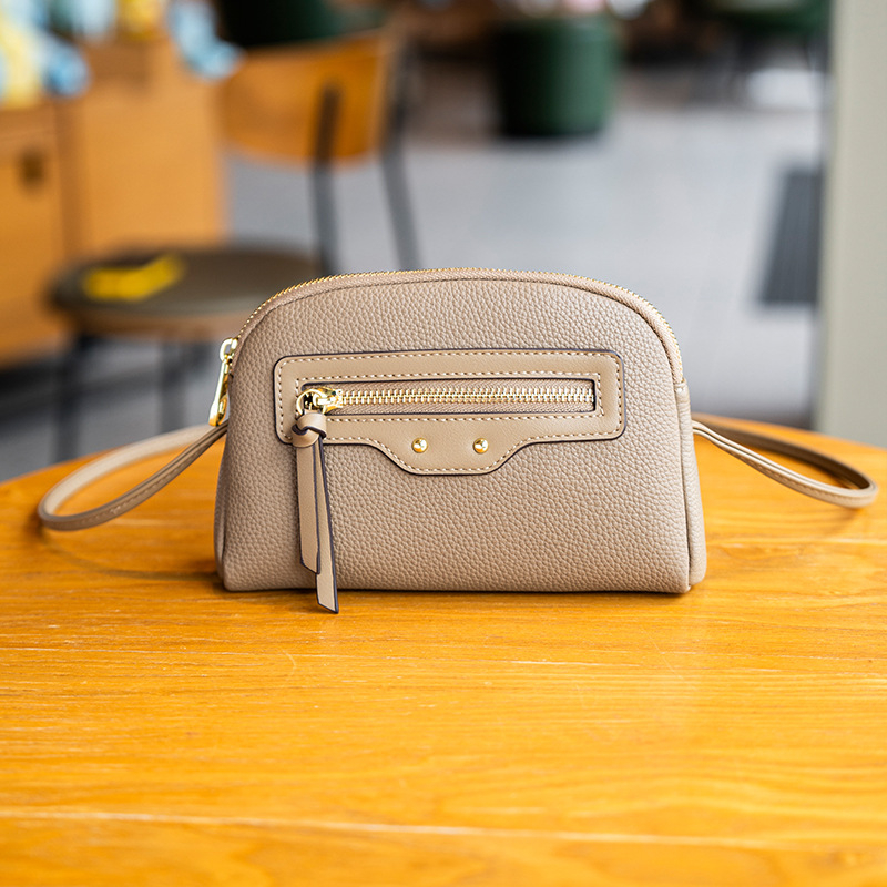 GELANDAI Crossbody soma – minimālistisks dizains, mazs kvadrātveida formāts, PU materiāls, rāvējslēdzējs aizvēršanai, iekšējie nodalījumi: tālruņa kabata, slēgta rāvējslēdzēja kabata, nodalījums, klēpjdatora kabata
