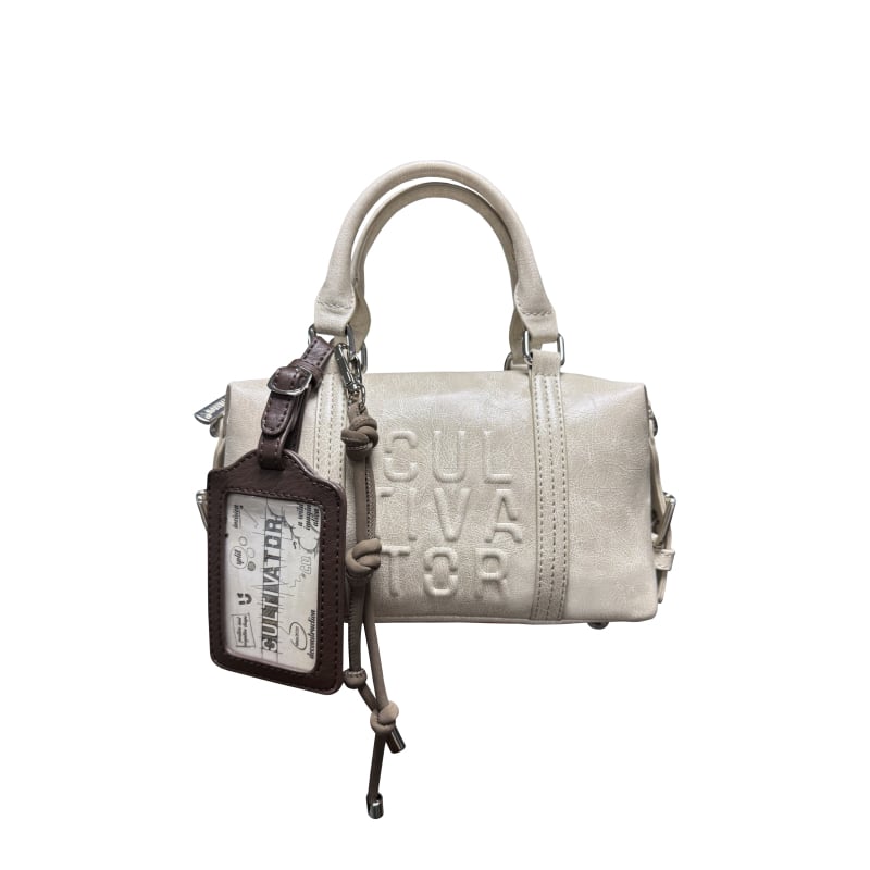 Párnás alakú keresztbody válltáska, flap zárás, rejtett cipzáras zseb és külső cipzáras zseb