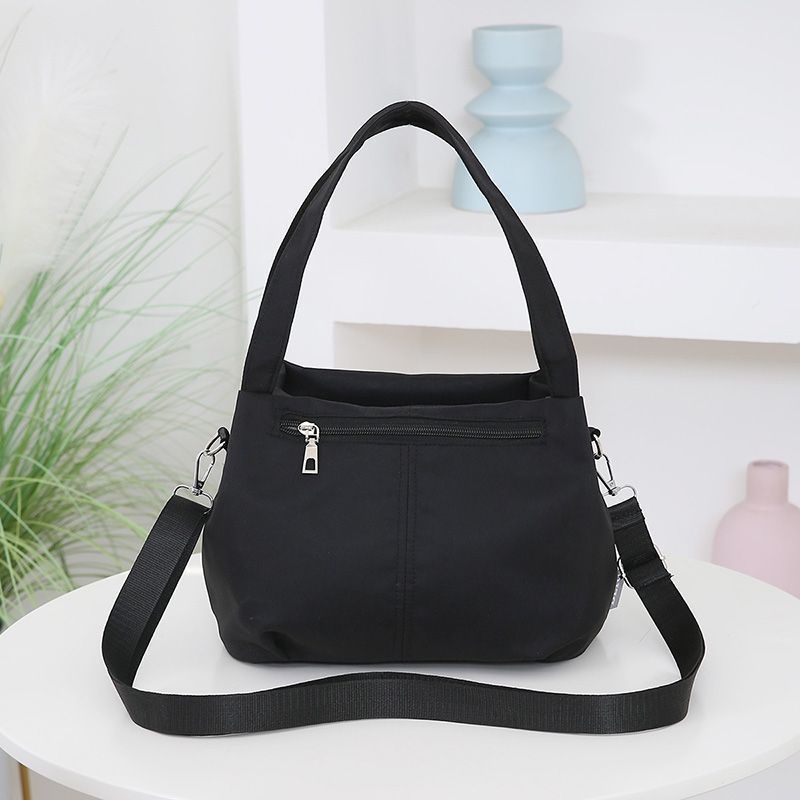 Nylon keresztbody táska – könnyű, nagy kapacitású, modern minimalista stílus