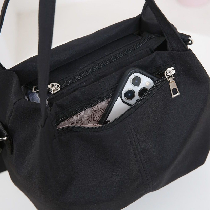 Nylon keresztbody táska – könnyű, nagy kapacitású, modern minimalista stílus