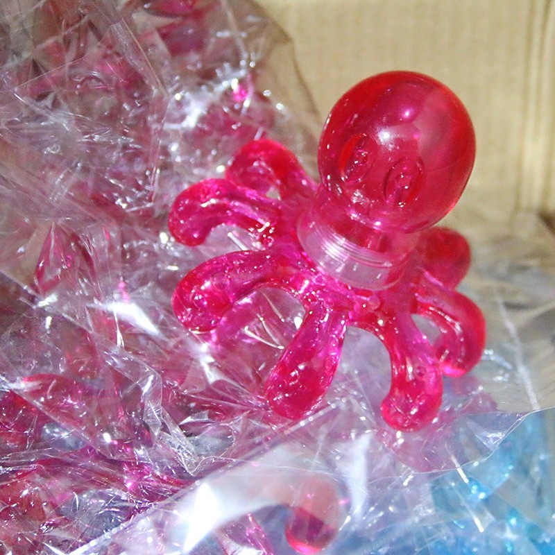 Fejmasszírozó polip formájú dizájnnal, akupunktúra pontok masszázsa, márka JIAN ZHUANG