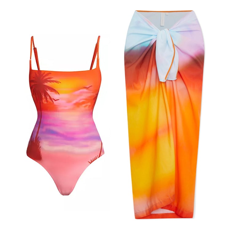 Бански костюм за едно парче с комплект обвивна пола и залезен принт; материя: нейлон 90%, подплата: полиестер 85%; чашки с подплата без метална опора