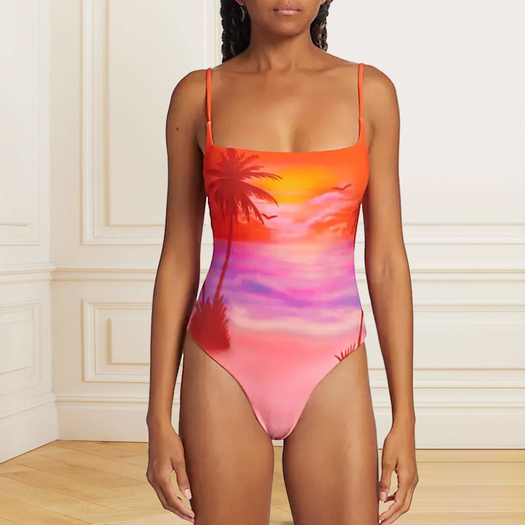 Бански костюм за едно парче с комплект обвивна пола и залезен принт; материя: нейлон 90%, подплата: полиестер 85%; чашки с подплата без метална опора