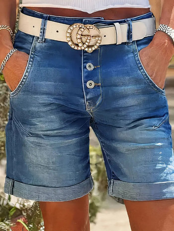 Τζιν παντελόνι με μήκος 3/4, ελαφρώς φαρδύς μέση, μικροελαστικό μίγμα βαμβακιού-πολυεστέρα (50–70% βαμβάκι, 30–50% πολυεστέρας), ίσιο κόψιμο, κλείσιμο με κουμπί