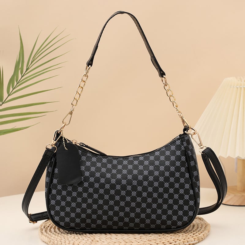 Eleganti PU crossbody krepšys su retro spauda, kompakti stačiakampis formos; turi telefonų kišenę ir dokumentų kišenę; užsegama užtrauktuku; dvigubos peties juostos; tinkama kasdieniam dėvėjimui.