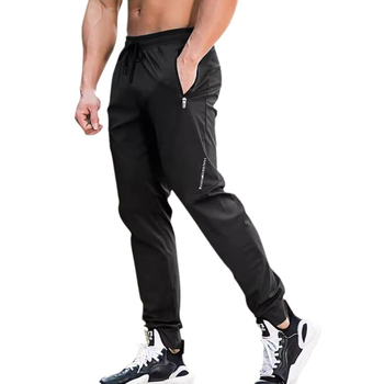 Ανδρικά χαλαρά αθλητικά παντελόνια από ύφασμα ice silk, φαρδιά γραμμή, μέση με ζώνη, κλείσιμο με κορδόνι, διαπνοή και απομάκρυνση υγρασίας