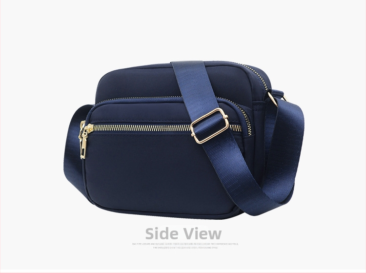 Női kompakt, négyzet alakú táska mindennapi használatra — városi egyszerű stílus, anyaga Oxford vászon, vízszintes négyzet alak, cipzáras nyitás, belső cipzáras zseb.