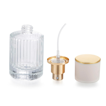 Стъклена бутилка за парфюм със винтово гърло, кръгло прозрачно тяло, дебело вертикално ивично стъкло, голям страничен спрей, тежък капак