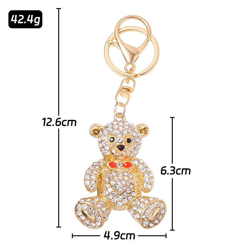 Raktų pakabukas su meškiuko karikatūra ir kaspinėliu, metalinis su krištolo akcentais, Korėjos stilius, kodas A-451