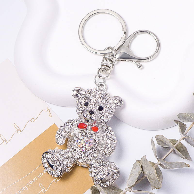 Raktų pakabukas su meškiuko karikatūra ir kaspinėliu, metalinis su krištolo akcentais, Korėjos stilius, kodas A-451