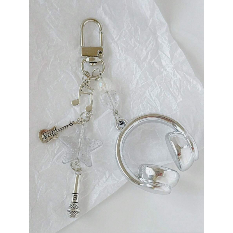 Fülhallgató alakú kulcstartó szélzene motívummal, kreatív dizájn, kínai stílus, héj anyag, cikkszám SH132920974