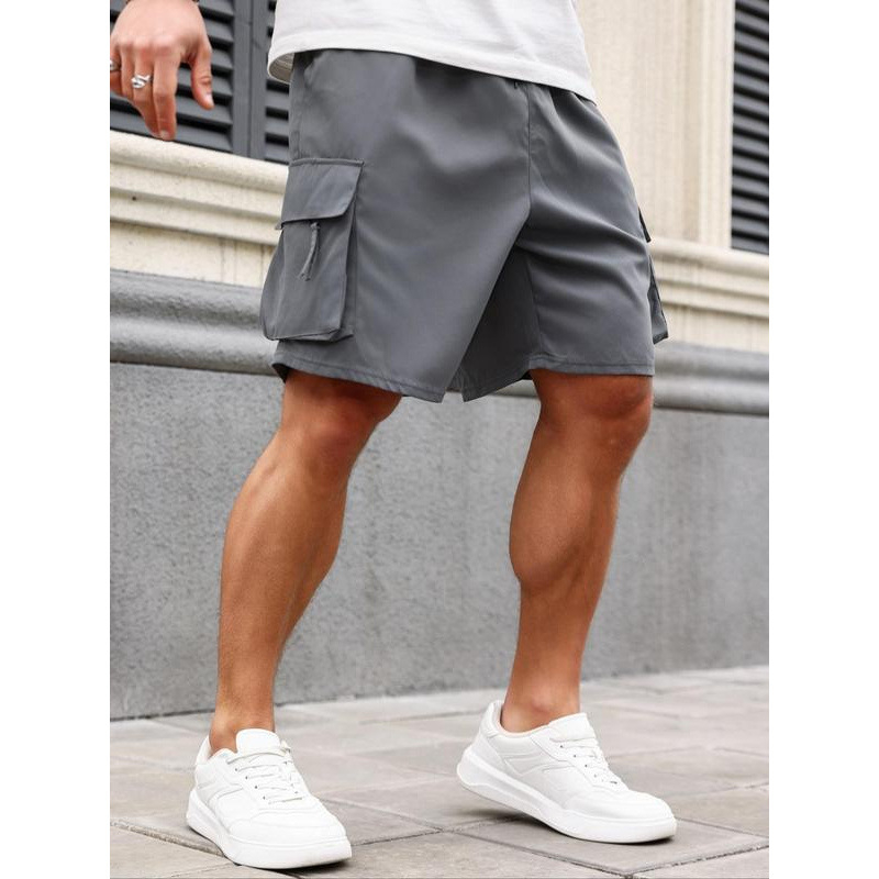 Krovininiai šortai su dangtelinėmis kišenėmis, laisvas kirpimas, trumpesnė ilgio, šiek tiek tempiasi, medvilnės CVC audinys
