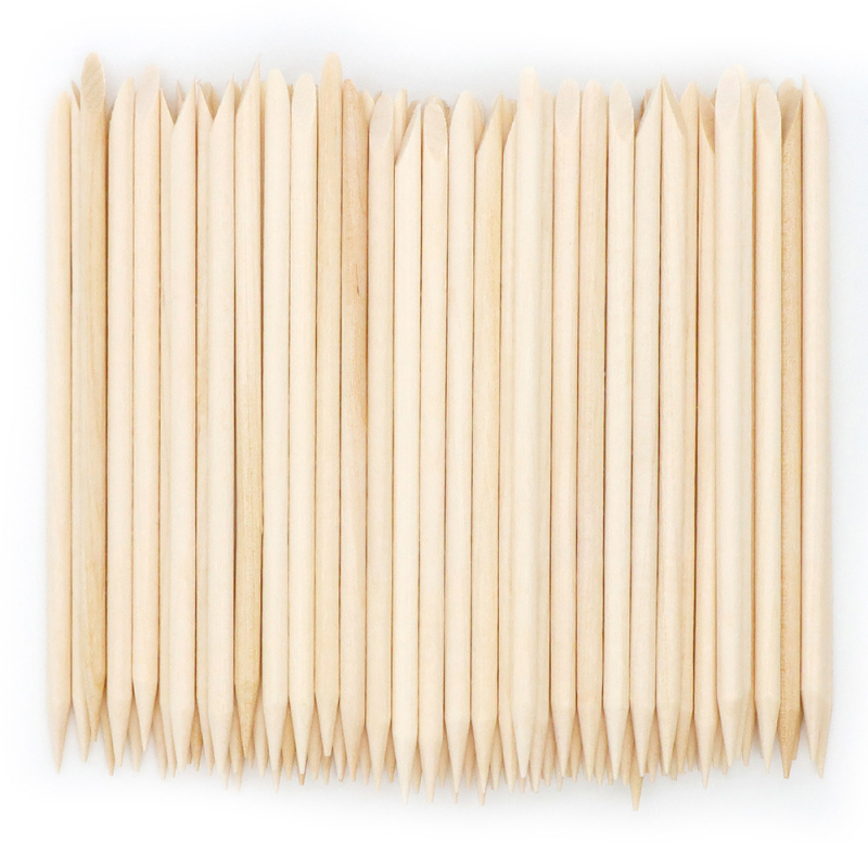 Kétoldalas, faanyagú manikűr eszköz – pontozó és domborító funkcióval, nyomás a körömágyon és tisztítás a körmökön