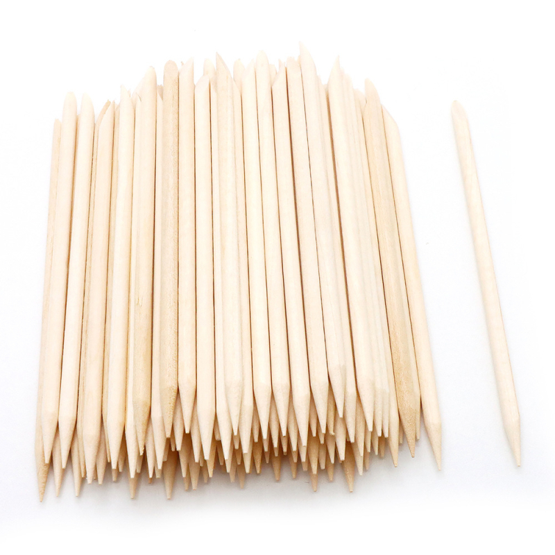 Kétoldalas, faanyagú manikűr eszköz – pontozó és domborító funkcióval, nyomás a körömágyon és tisztítás a körmökön