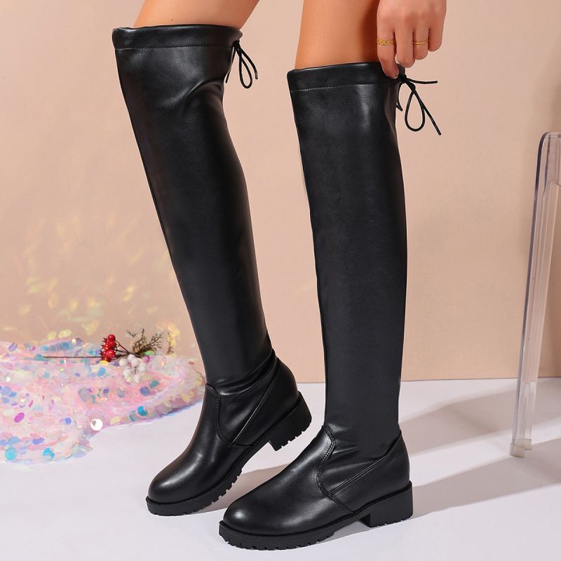 Ceļgalu garuma zābaki, PU augšdaļa, imitācijas ādas odere, apaļa purngale, masīvs zem papēdis 1–3 cm, vienkrāsains raksts