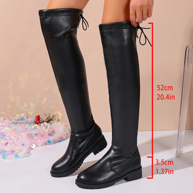 Kojų iki kelių batai, PU viršus, dirbtinės odos pamušalas, apvali nosis, masyvus žemas kulnas 1–3 cm, vientisas raštas