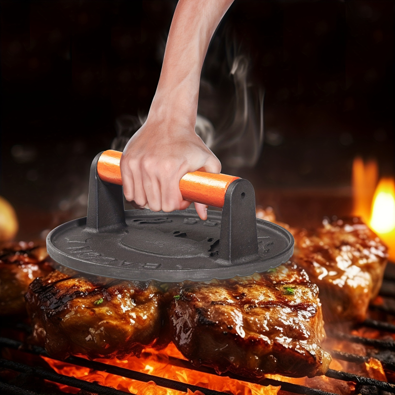 Mēsa prese no dzelzs, manuāla, ar neslīdošu virsmu, bez pārklājuma, ar koka rokturu; svars 1 kg, dziļums 1 cm, forma kvadrāts vai aplis