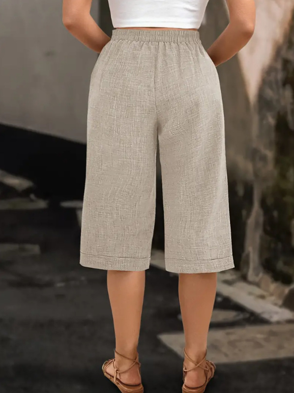 Sieviešu ikdienas bikses, augsta viduklis, kapri garums, taisns griezums, plāns poliesters