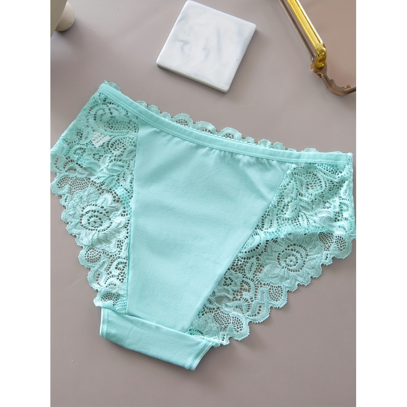 Moterų gėlių nėrinių kelnaitės komplektas su vidutiniu liemeniu; medžiaga: nailonas/spandeksas 90/10; pamušalas: 90% nailonas, 10% spandeksas; raštas: gėlės; vasara