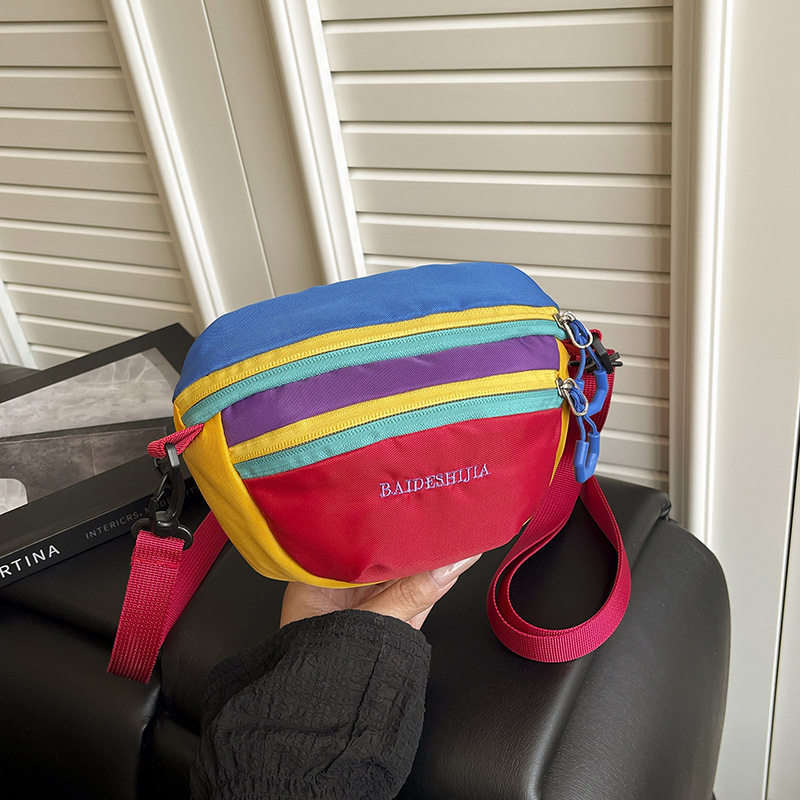 Unisex mini crossbody krepšys, Oxford audinys, vidinė kišenė – nailonas, užtrauktukas, vidiniai kišenės: užtrauktuko kišenė, telefono kišenė, ID kišenė, ovalo formos, laisvalaikio kelionėms