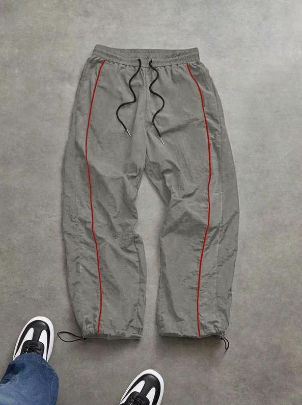 Sporta ikdienas bikses ar krāsu blokiem un svītrainu rakstu, šņorēšana, ātri žūst, elpojošas, plata kāja, garas vīriešu bikses, 80% poliester-pamatu maisījums