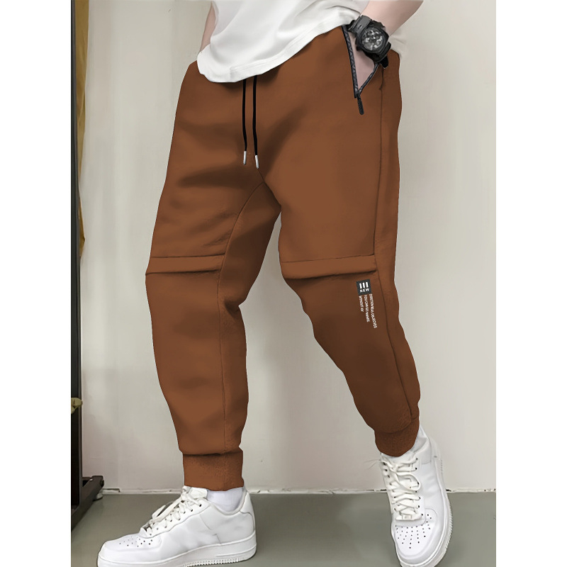 Vīriešu brīvās piegriezuma sporta bikses ar flīsa odai, 100% poliesters, josta ar auklu, garas