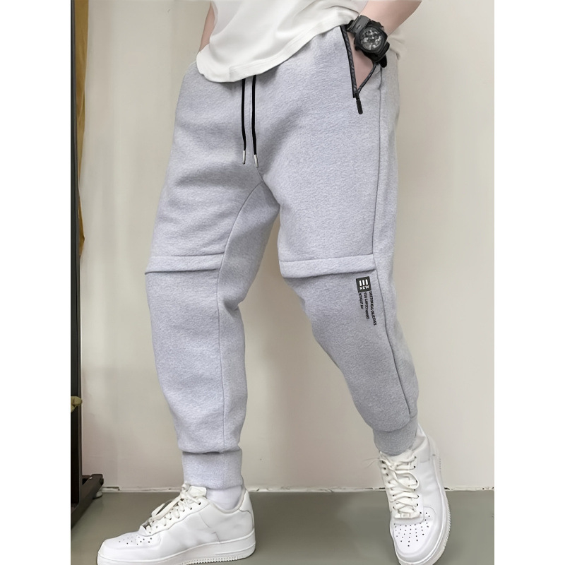 Vīriešu brīvās piegriezuma sporta bikses ar flīsa odai, 100% poliesters, josta ar auklu, garas