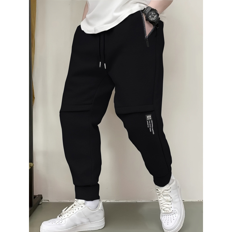 Vīriešu brīvās piegriezuma sporta bikses ar flīsa odai, 100% poliesters, josta ar auklu, garas