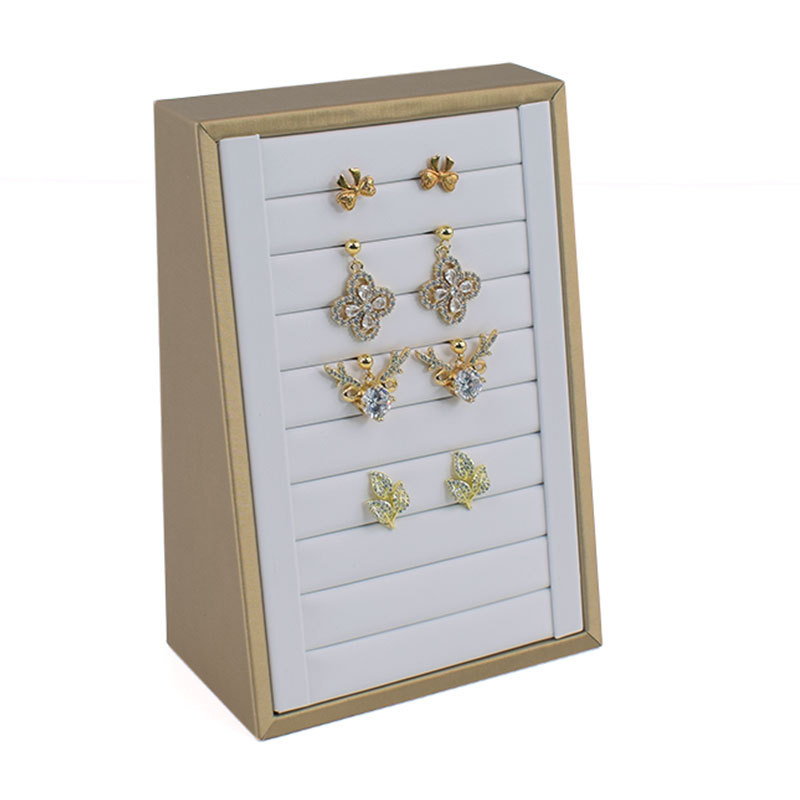 Gyűrűk és fülbevalók kiállító tálca textúrált bőrrel – Elegáns ékszerkiállító állvány, művészi stílus, 2025 tavasz