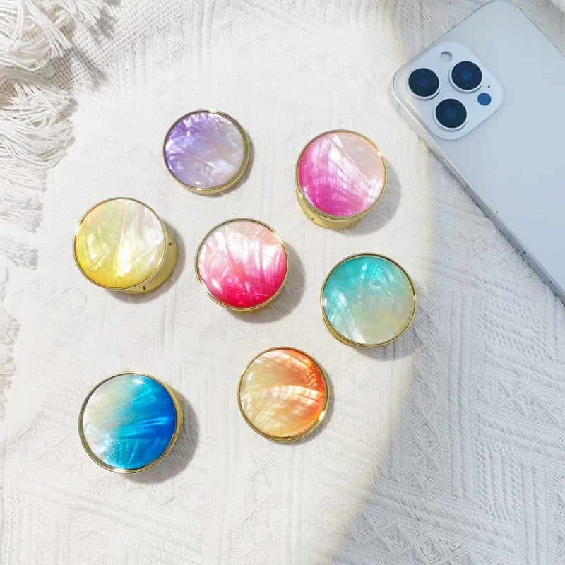 Stāvvai telefona turētājs ar čaulām motīvu no sveķiem, gaisa spilvens, elektroplatinga pārklājums, universāls stils, logotipa pielāgošana — Viqing basket