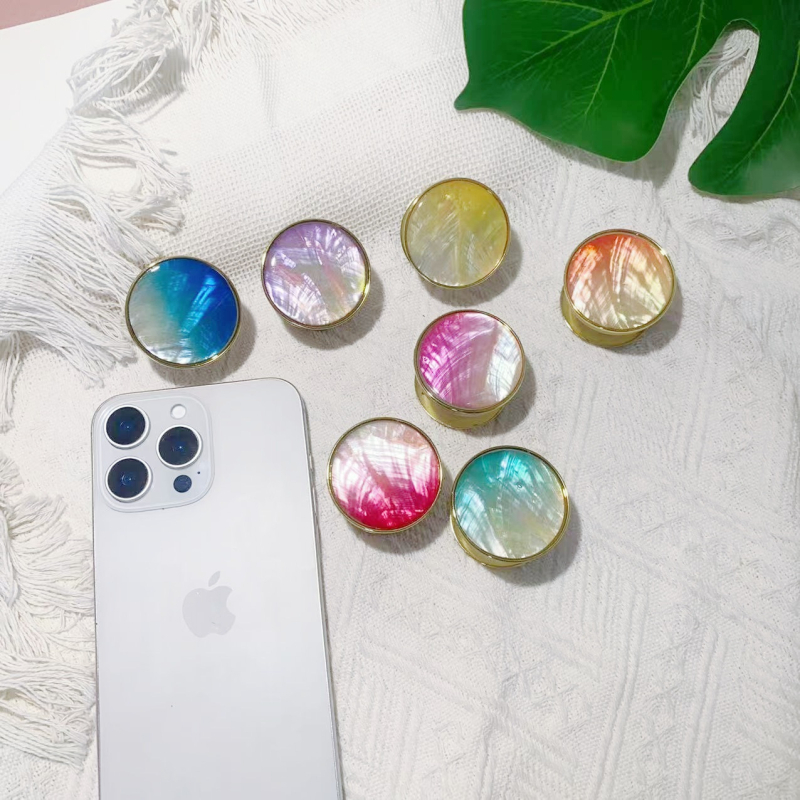 Stāvvai telefona turētājs ar čaulām motīvu no sveķiem, gaisa spilvens, elektroplatinga pārklājums, universāls stils, logotipa pielāgošana — Viqing basket