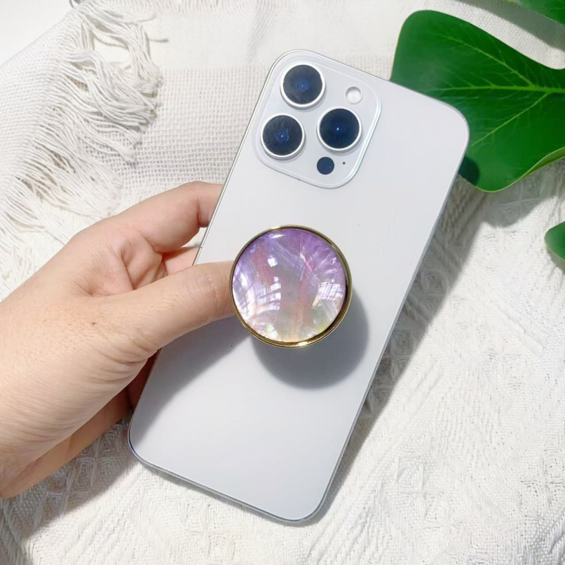 Stāvvai telefona turētājs ar čaulām motīvu no sveķiem, gaisa spilvens, elektroplatinga pārklājums, universāls stils, logotipa pielāgošana — Viqing basket