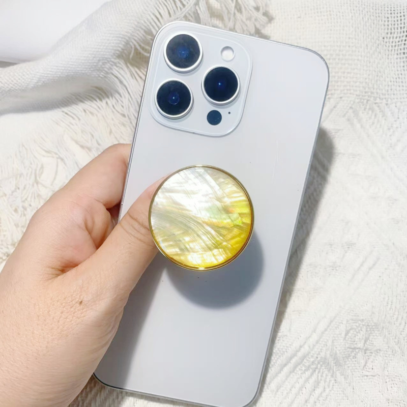 Stāvvai telefona turētājs ar čaulām motīvu no sveķiem, gaisa spilvens, elektroplatinga pārklājums, universāls stils, logotipa pielāgošana — Viqing basket