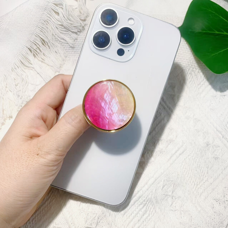 Stāvvai telefona turētājs ar čaulām motīvu no sveķiem, gaisa spilvens, elektroplatinga pārklājums, universāls stils, logotipa pielāgošana — Viqing basket