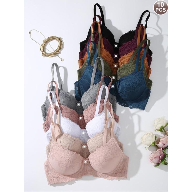 Krūštura komplekts ar tauriņa mezglu dekoru un kontrastējošu mežģīni, savilkuma dizains, trijstūrveida kausi, vidēji veidoti kausi