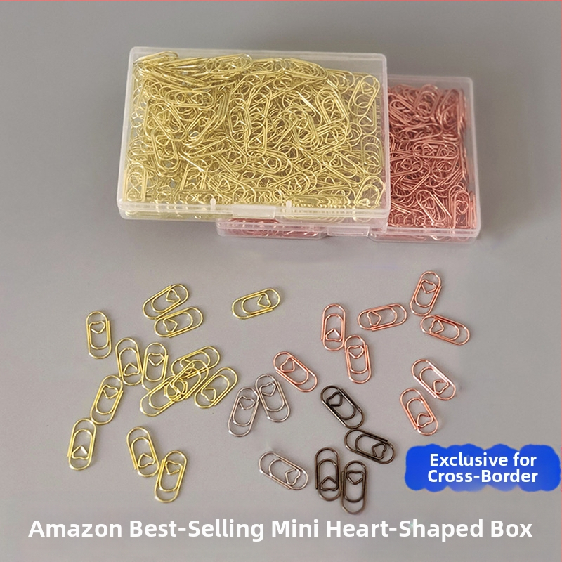 Mini sponky na papier v tvare srdca, kovovo-plastová konštrukcia, v priehľadnej plastovej krabičke – kancelárske potreby