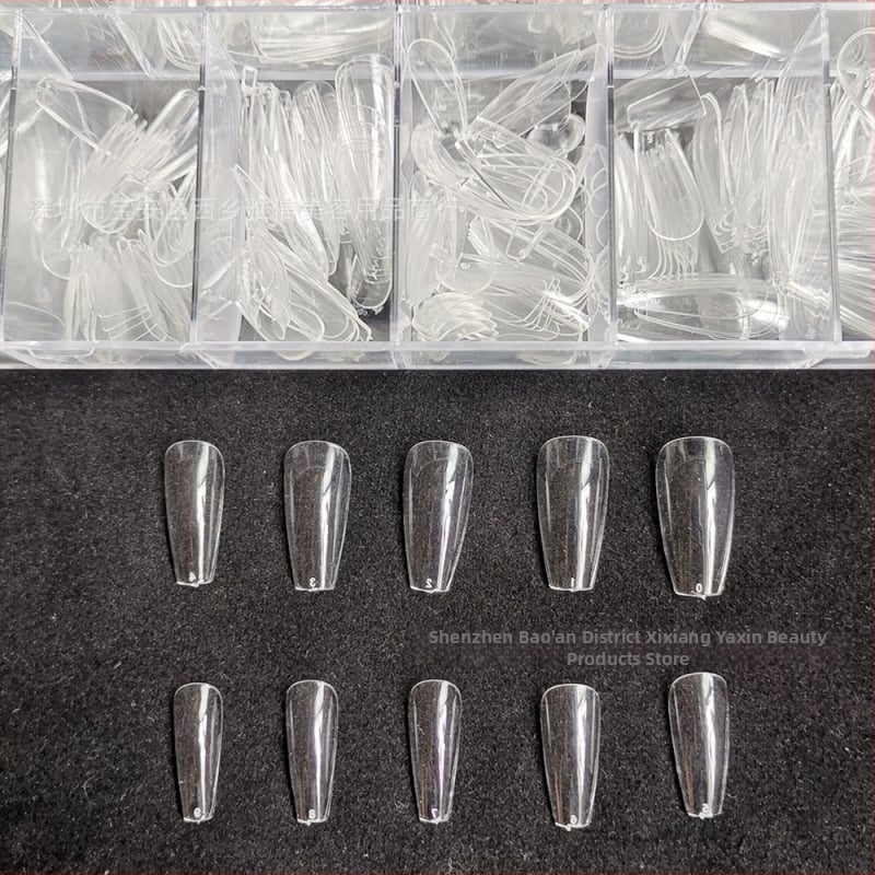 Διάφανα τεχνητά νύχια για κόλλημα, χωρίς λιμάρισμα και ίχνη, κουτί 500 τεμάχια; Σχήματα: τραπεζοειδή, σταγόna νερού και τετράγωνα; περιλαμβάνονται αυτοκόλλητα νυχιών.