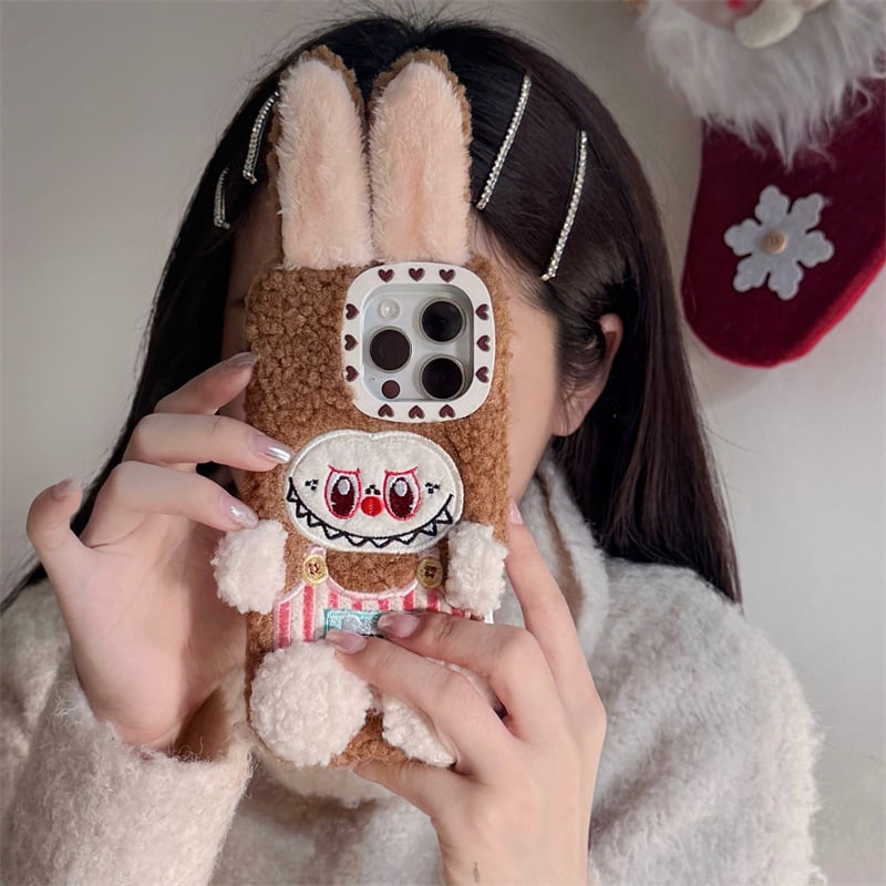 Pllős plüss iPhone tok 11–14 sorozathoz (beleértve Pro/Max) – TPU keret, leesés elleni védelem, 3D plüss kivitelezés, kompatibilis az iPhone 11, 12, 12 Pro/Max, 13, 13 Pro/Max, 14, 14 Pro/Max