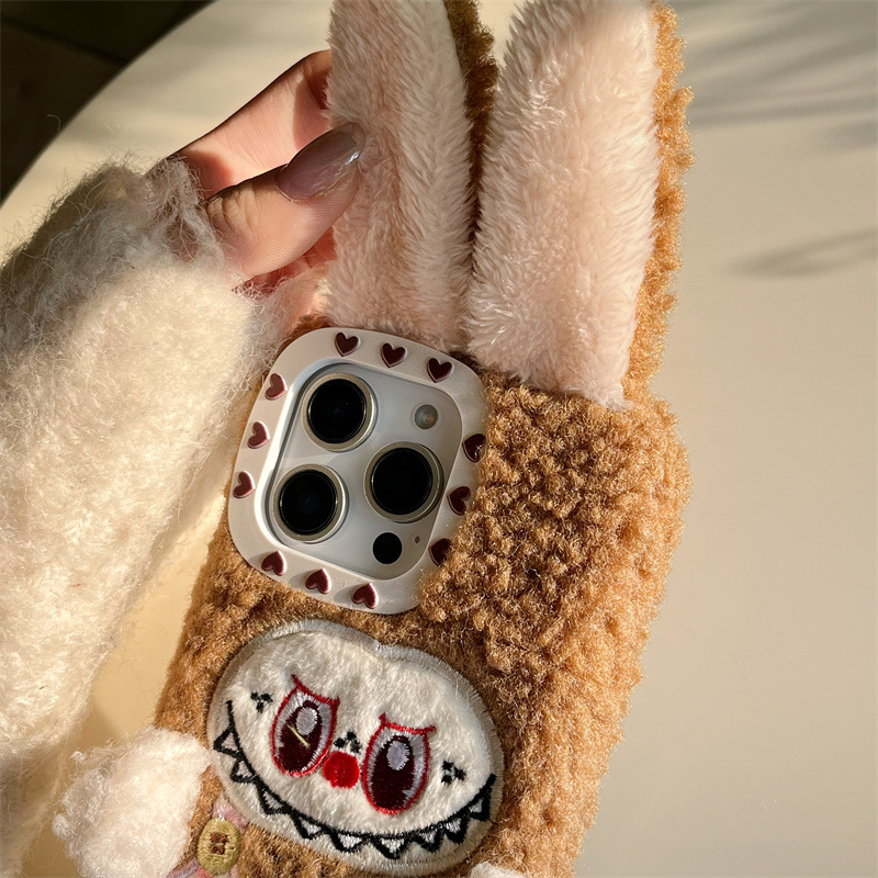 Pllős plüss iPhone tok 11–14 sorozathoz (beleértve Pro/Max) – TPU keret, leesés elleni védelem, 3D plüss kivitelezés, kompatibilis az iPhone 11, 12, 12 Pro/Max, 13, 13 Pro/Max, 14, 14 Pro/Max
