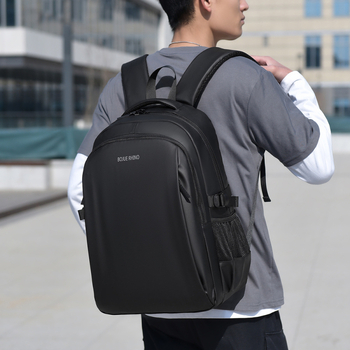 Ανδρικό σακίδιο πλάτης για επαγγελματικά ταξίδια: αδιάβροχο, θήκη για 12 ιντσών φορητό, χωρητικότητα 20–35 L, ιμάντες με αερόσακους, αστικός μινιμαλιστικός σχεδιασμός
