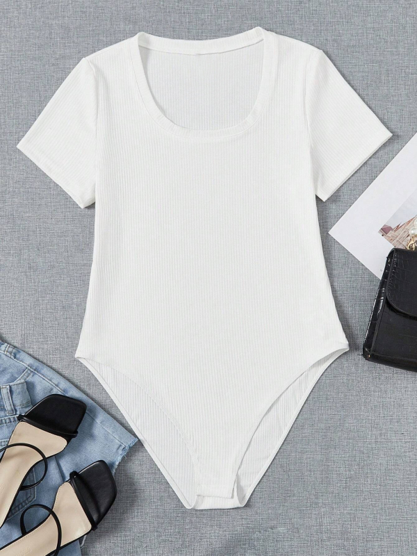 Plus veličine ženski kombinezon, elegantan i profinjen, poliester, okrugli izrez, rukav ¾, tijesan kroj, gumbi