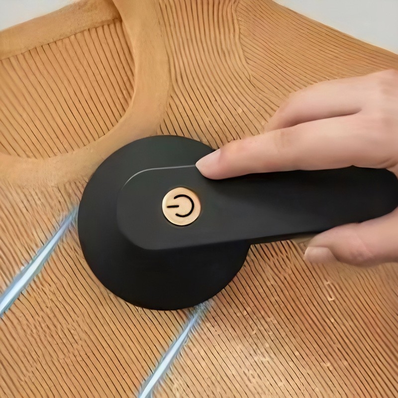 Audumu pūku noņemšanas ierīce – plastmasas korpuss, modelis 719, uzsākts 2024. gadā, pūku ritinājs un matu noņemšana