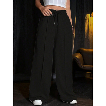 Sporta bikses ar brīvu piegriezumu un šņori jostā, acetāta šķiedru maisījums, trīs rindu pogas, 2023. gada vasara