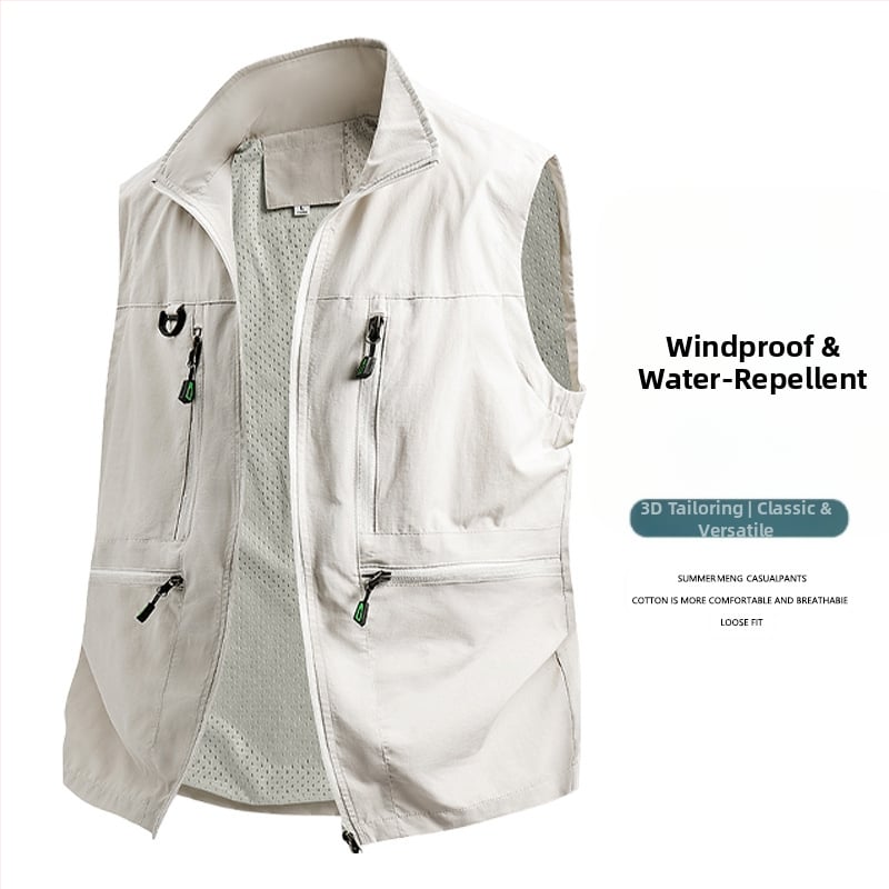 Vīriešu darba veste ar daudzām kabatām - brīvs piegriezums, stāvā apkakle, rāvējslēdzēja aizdare, elpojošs poliestera materiāls, vienkrāsaina, pavasara–rudens sezona