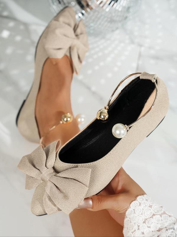 Γυναικείες φλατ με φιόγκο και λουρί στον αστράγαλο, πάνω μέρος από ραφία, με ανοιχτό δάχτυλο, άνοιξη