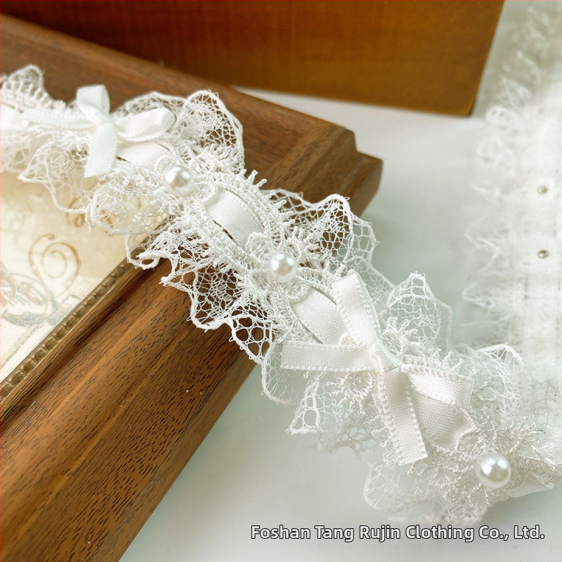 Polyesterová čipka s korálkami a mašličkou pre oblečenie, závesy a remeslá