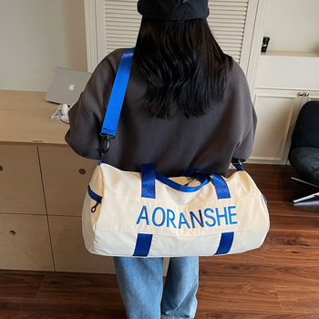 Crossbody soma fitnesam un jogai ar cilindrisku dizainu, 36-55L, neilons, salokāma ar mitrā/sausā atdalīšanu, starptautiskais stils, brīvdienu ceļojumiem