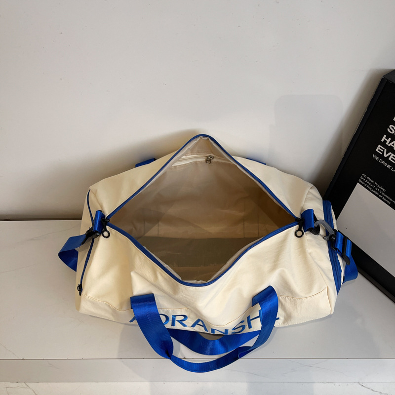 Crossbody soma fitnesam un jogai ar cilindrisku dizainu, 36-55L, neilons, salokāma ar mitrā/sausā atdalīšanu, starptautiskais stils, brīvdienu ceļojumiem